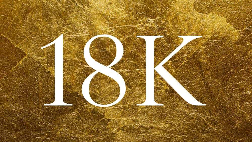 Close up of a gold bar with 18k written on it
