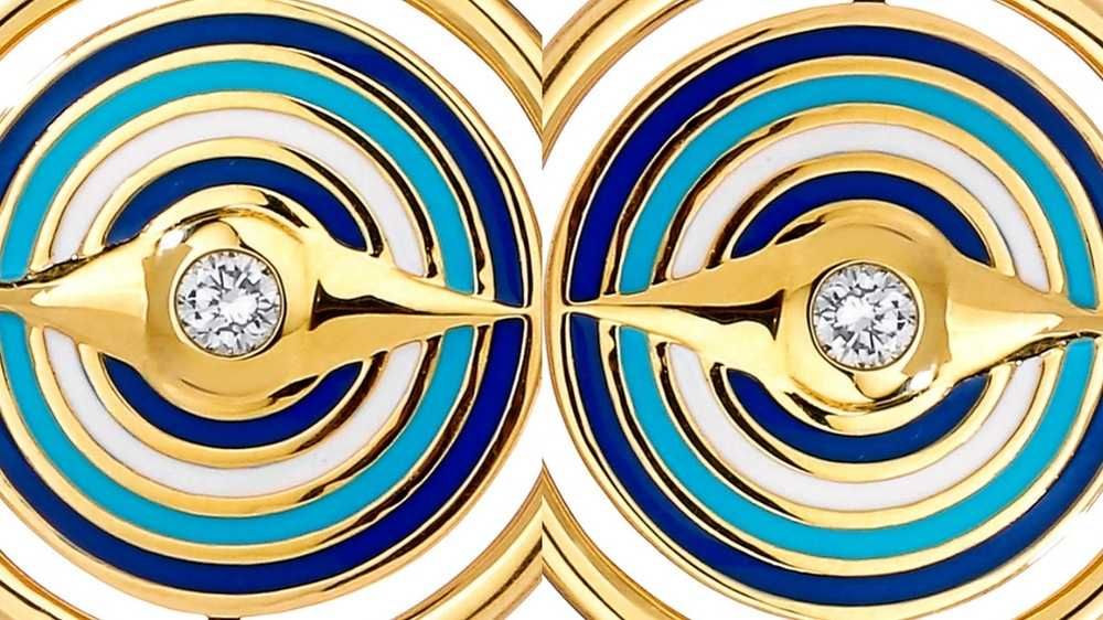 Evil eye pendants put together like binoculars