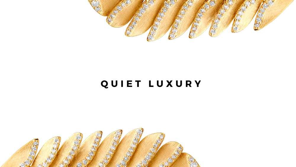 cross section of a satin feather earring shown on the edges to depict quiet luxury